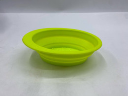 collapsible silicone travel bowl, likely for a pet. 