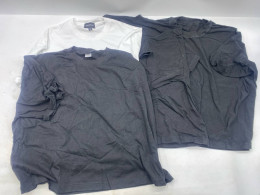 Set of 4 Men's white and black crew neck t-shirts. 