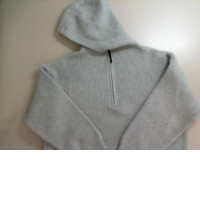 Knitted sweater with a zip-up hood