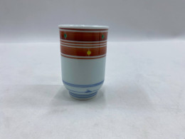 Glass, Japanese style porcelain tea cup.
