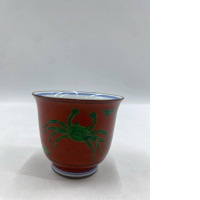 Japanese porcelain tea bowl or sake cup with a crab pattern. 