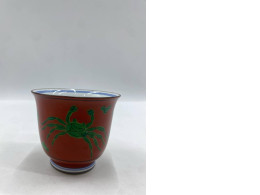 Japanese porcelain tea bowl or sake cup with a crab pattern. 