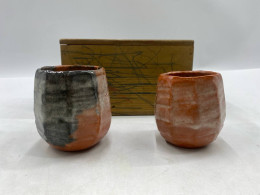 Set of 2 A Japanese glass teacup (yunomi) or Raku or Shino teacup, in a wooden box. Set of 2 A Japanese glass teacup (yunomi) or Raku or Shino teacup, in a wooden box.