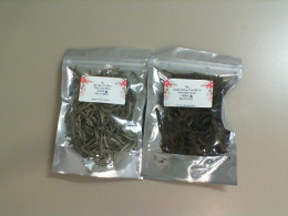 A set of 2 types of loose leaf tea, Thailand. Bai Hao Yin Zhen Mae Nam Khun. GuShu Sheng Puer