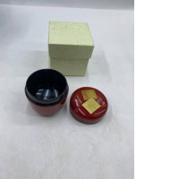 Plastic teapots in cardboard boxes.