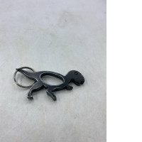 Dinosaur-shaped bottle opener