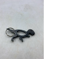 Dinosaur-shaped bottle opener