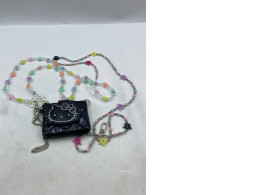 Black shoulder bag with Kitty design.