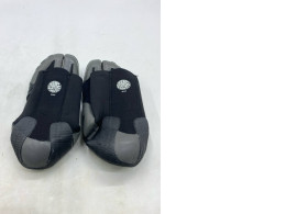  black and grey Rip Curl Dawn Patrol 3mm split toe wetsuit boots made of neoprene. 
