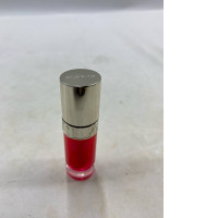 The Clarins Lip Comfort Oil might be in the shade Pitaya.