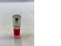 The Clarins Lip Comfort Oil might be in the shade Pitaya.