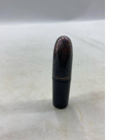  limited edition M·A·C Kiss of Stars lipstick with a glittery finish. 
