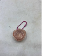 Fwee Lip & Cheek Glowy Jelly Pot (or Pudding Pot) with a pink pendant keyring attachment. Fwee Lip & Cheek Glowy Jelly Pot (or Pudding Pot) with a pink pendant keyring attachment.