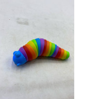 articulated rainbow fidget slug toy. 