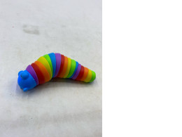 articulated rainbow fidget slug toy. 