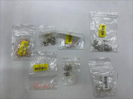 set of 7 Metal pendants for decorating necklaces.