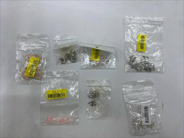 set of 7 Metal pendants for decorating necklaces. set of 7 Metal pendants for decorating necklaces.