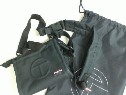 Black waist bag with a case