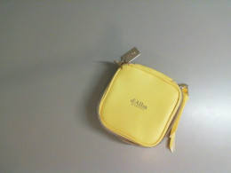 Small yellow cosmetic bag Small yellow cosmetic bag