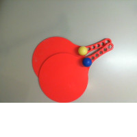 Rackets and balls for playing on the beach