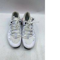 They are white Nike sneakers.