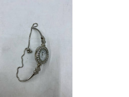 Silver women's wristwatch Silver women's wristwatch