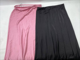 Set of 2 Women's long skirt in black and pink. Set of 2 Women's long skirt in black and pink.