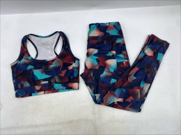 women's athletic sports bra and leggings set with a geometric abstract print. women's athletic sports bra and leggings set with a geometric abstract print.