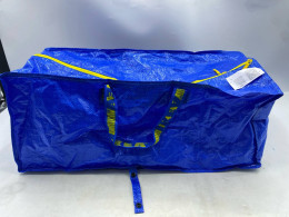  IKEA FRAKTA carrier bag, likely the large size in blue polypropylene with a zipper. 