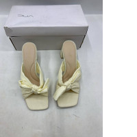  pair of Loeffler Randall Camellia pleated bow heeled sandals in off-white fabric. 