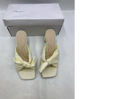  pair of Loeffler Randall Camellia pleated bow heeled sandals in off-white fabric. 