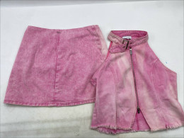 pink acid wash denim mini skirt and matching zip-up halter top set. pink acid wash denim mini skirt and matching zip-up halter top set.