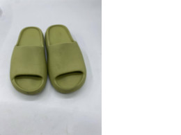 Adidas Yeezy Slide sandals in "Resin" color.