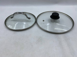 Set of 2 universal tempered glass lids for pots and pans. Set of 2 universal tempered glass lids for pots and pans.