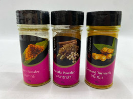 Set of 3 My Choice brand spice bottles, curry powder, masala powder, and turmeric powder. 