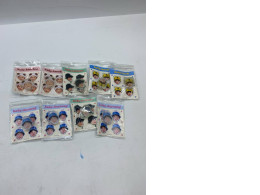 Set of 9 Pen casings in the shape of celebrities.