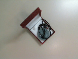 Neck decoration, pendant on a rope, in a gift box