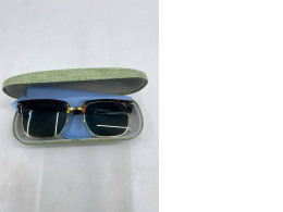 Fashionable sunglasses in a glasses case.