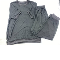 A black short-sleeved shirt and black long trousers. A black short-sleeved shirt and black long trousers.