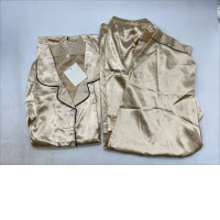 Women's gold satin pajamas
