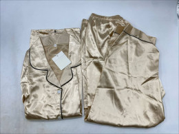 Women's gold satin pajamas