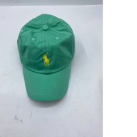 Polo Ralph Lauren cotton chino baseball cap in green with a yellow embroidered logo. 