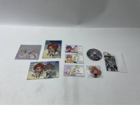 Mini set of Japanese anime cards and badges