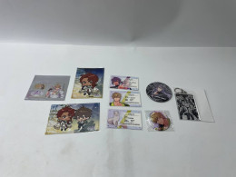 Mini set of Japanese anime cards and badges