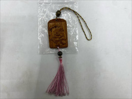 Wooden plaque in the shape of a fat person for hanging on a phone.