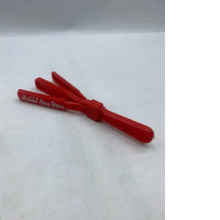 "Happy New Year" red plastic clapping stick. "Happy New Year" red plastic clapping stick.