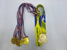 Set of 4 Gold Medal "Winner"