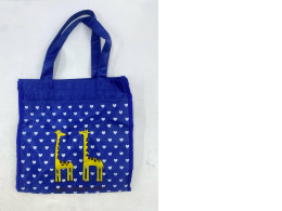 blue tote bag with a white heart and yellow giraffe pattern. blue tote bag with a white heart and yellow giraffe pattern.