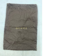  brown cotton Gucci drawstring dust bag. 