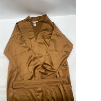 gold or honey-colored silk or satin kimono-style robe or gown. 